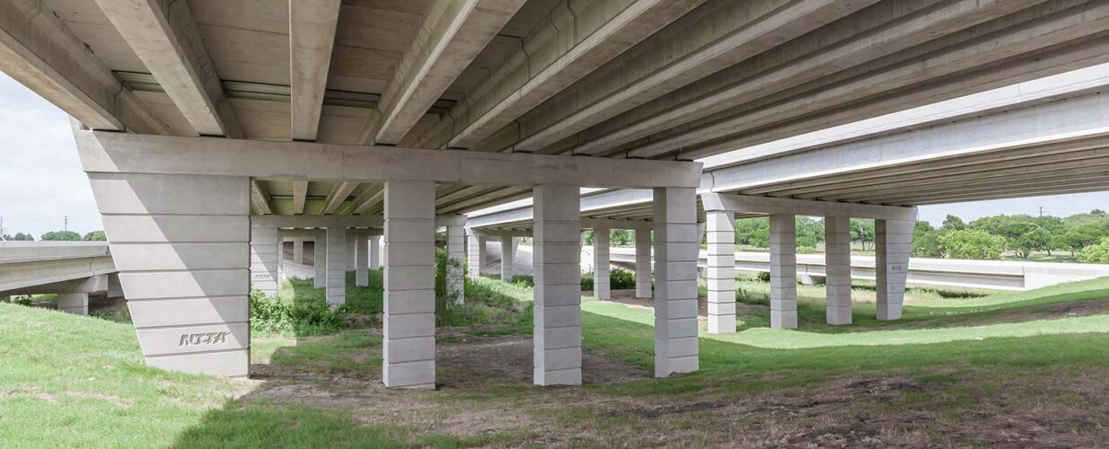 view of bridge columns under bridge at PGBT